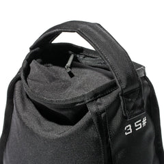 Close-up of a Sand Kettlebell with handles and "35" printed in white on the side, perfect as a portable kettlebell for home workouts.