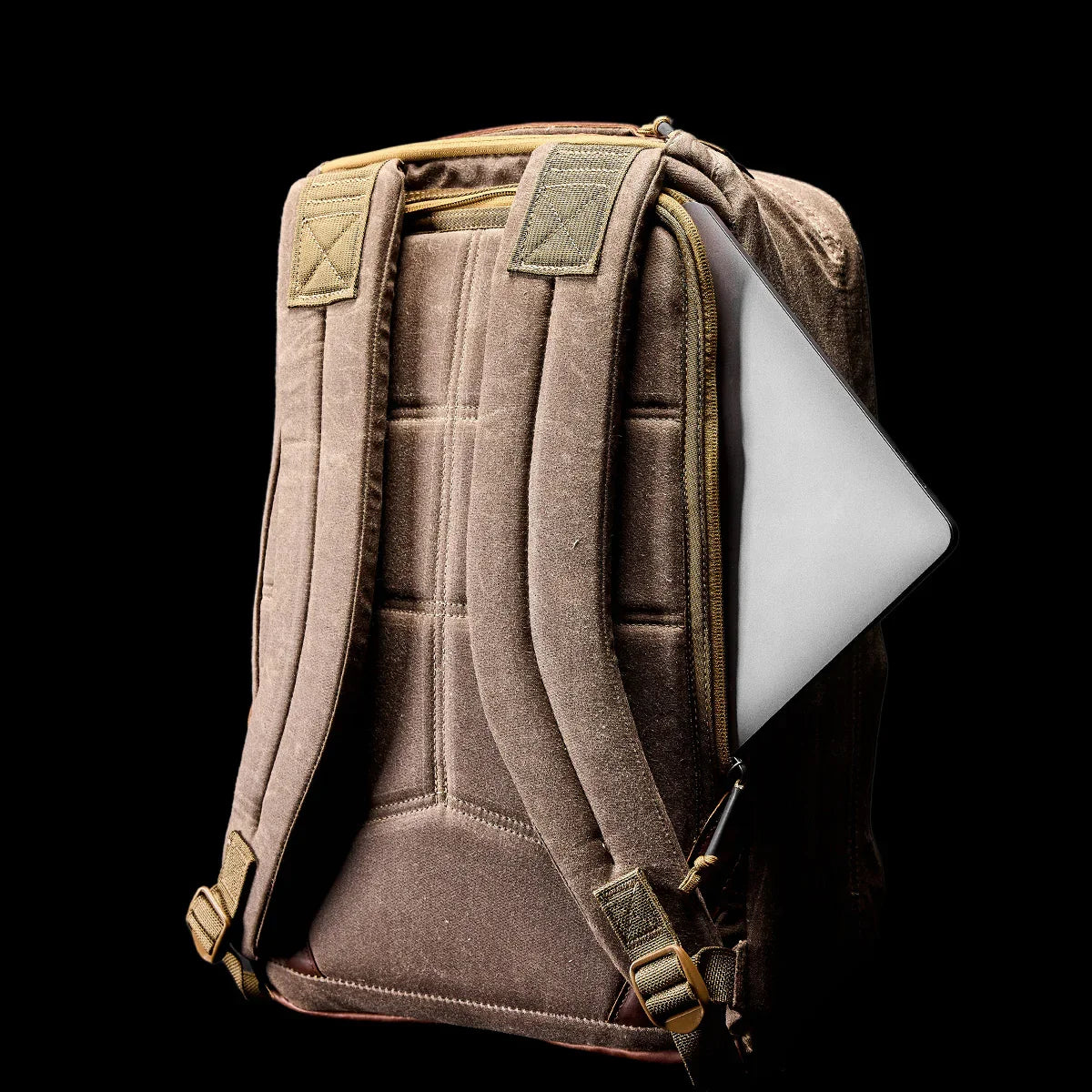 GORUCK dark oak rucksack rear view with laptop in zippered pocket, rugged rucking gear