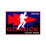 A patch for the Normandy Event Weekend features a soldier silhouette, red arrow, "GORUCK 82ND D-DAY WOD," barbed wire, and honors the 82nd Airborne Division’s role at D-Day Normandy.