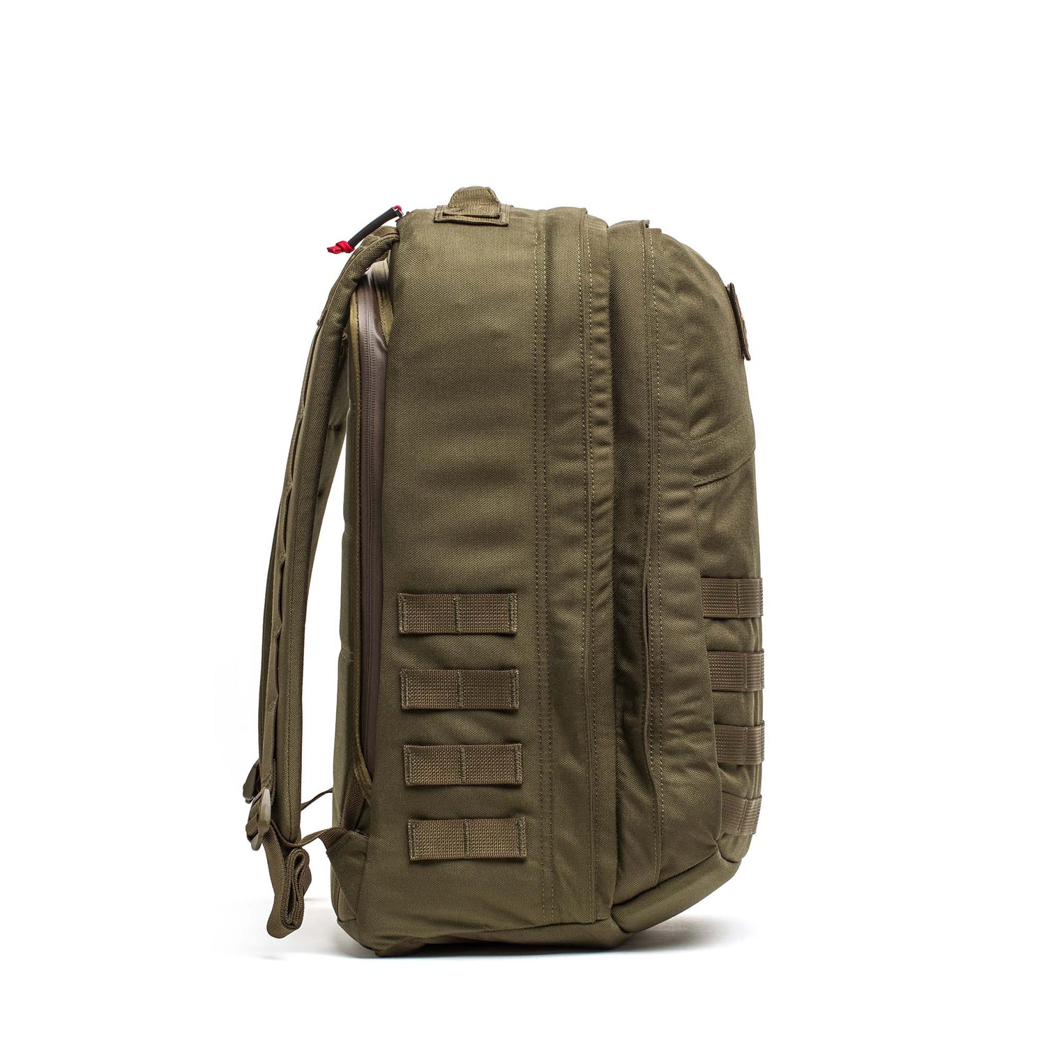 Side view of the olive green GR2 - Cordura backpack featuring multiple straps and a zippered compartment, perfect as a carry-on travel bag, shown on a white background.