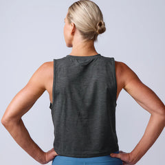 Woman wearing a dark sleeveless GORUCK training tank, shown from the back.