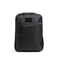 GORUCK black rucking backpack with top handle and front patch on white background