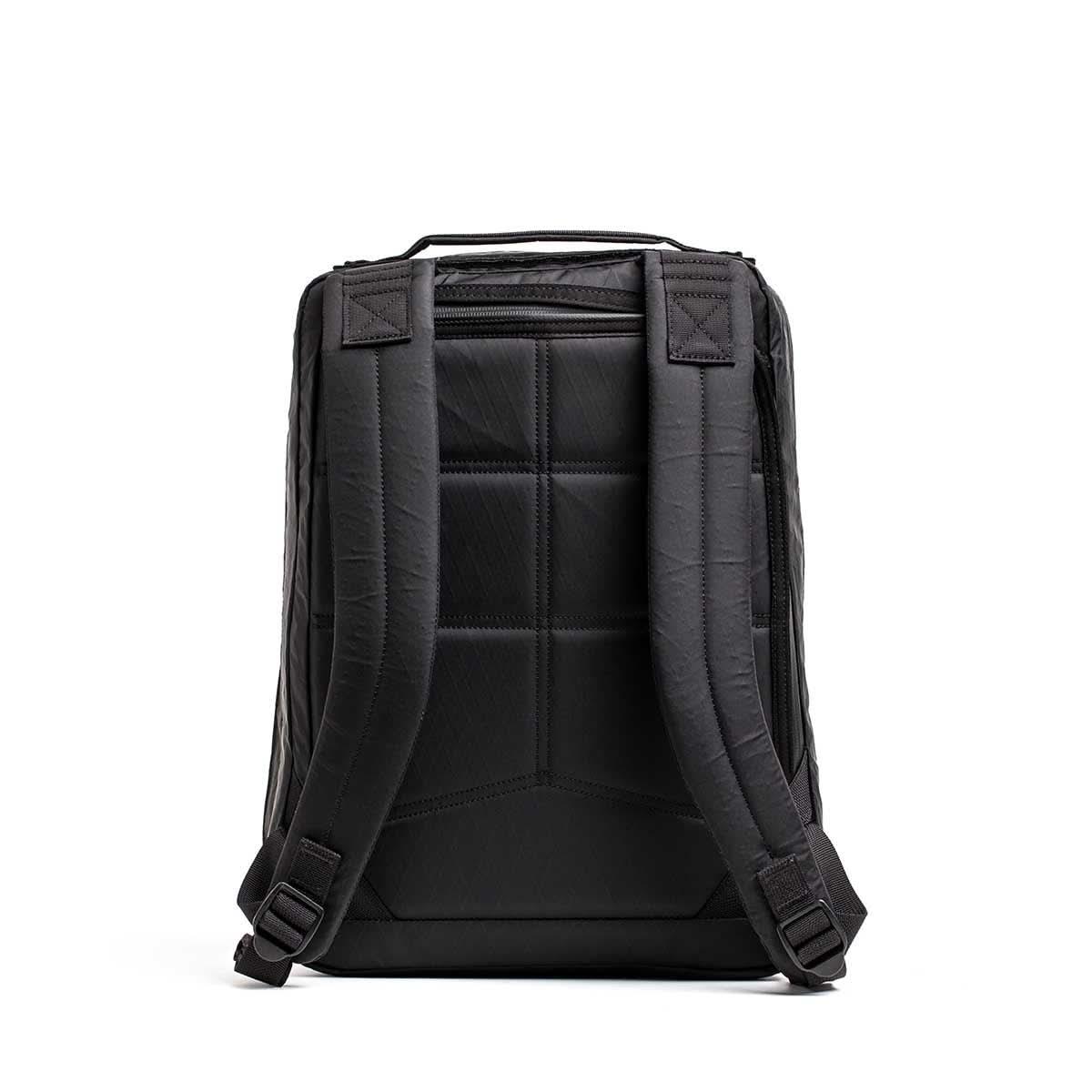 GORUCK black rucksack backpack, padded straps, rugged design, shown from back, white background