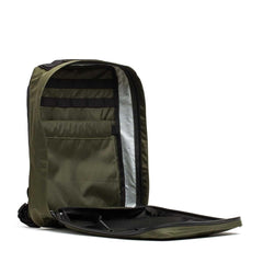 GORUCK dark green rucksack with open main compartment and internal pockets, rugged gear
