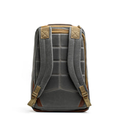 GORUCK Heritage Slate backpack, rugged grey fabric, padded straps, tan accents, rear view