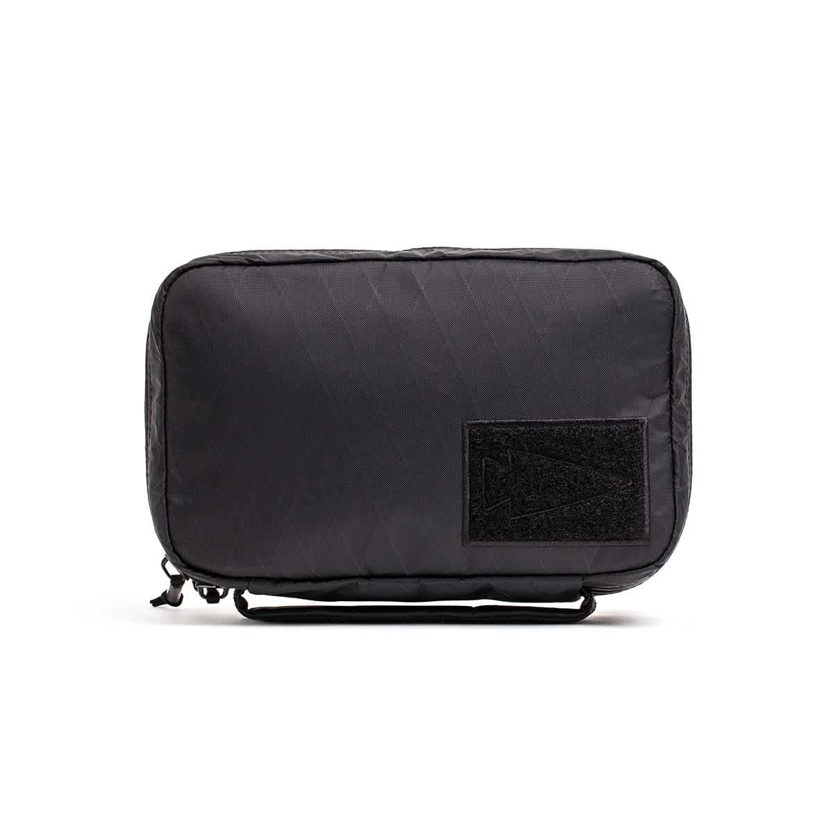 GORUCK black tactical field pouch with Velcro patch on white background