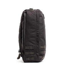 GORUCK black rucking backpack side view with MOLLE webbing, durable outdoor gear