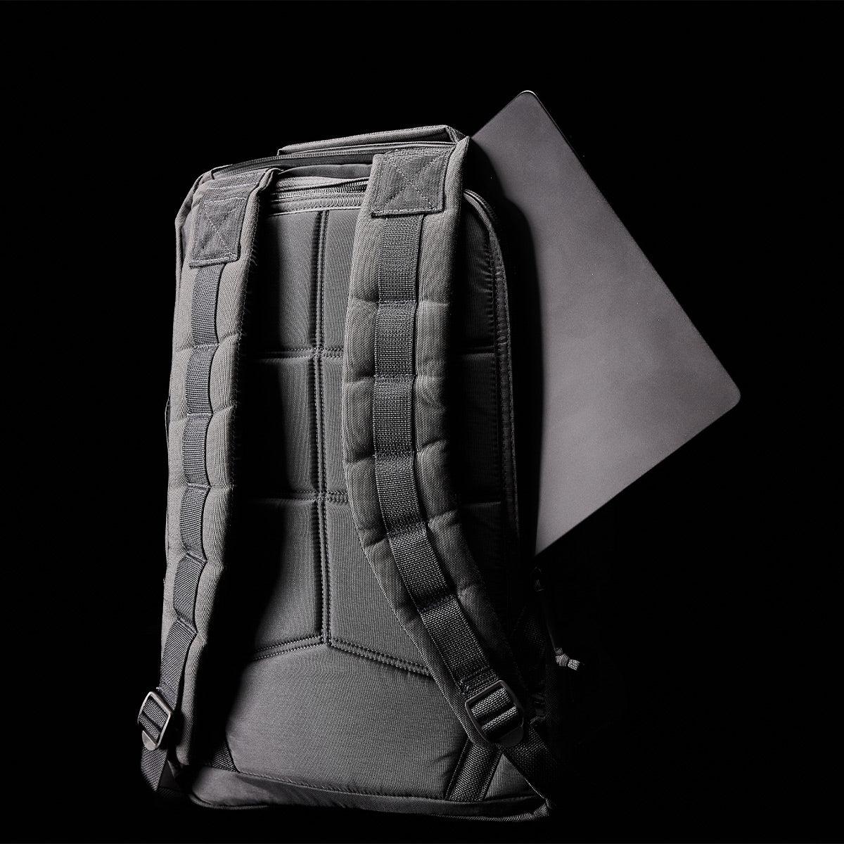 GORUCK GR1 Wolf Grey rucksack with padded straps and laptop sleeve on black background