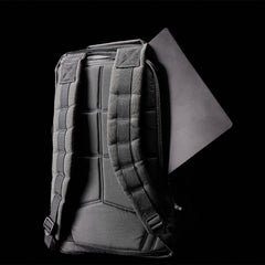 GORUCK GR1 Wolf Grey rucksack with padded straps and laptop sleeve on black background