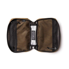GORUCK GR1 Field Pocket XPAC Slick Coyote open, showing mesh compartments and gear inside.