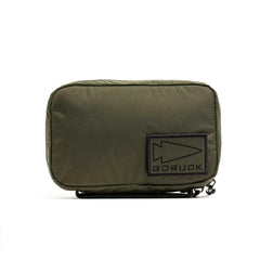 GORUCK Field Pocket XPAC Slick in dark green, rugged compact gear pouch with logo patch