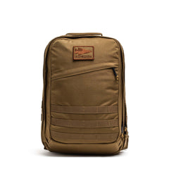 GORUCK brown tactical rucksack backpack with logo patch and MOLLE webbing on white background