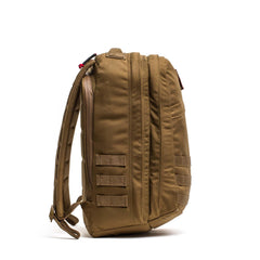 GORUCK coyote brown 26L rucksack with padded straps and multiple MOLLE webbing on side view