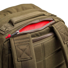 GORUCK Ranger Green backpack closeup showing durable 1000D Cordura fabric and red interior