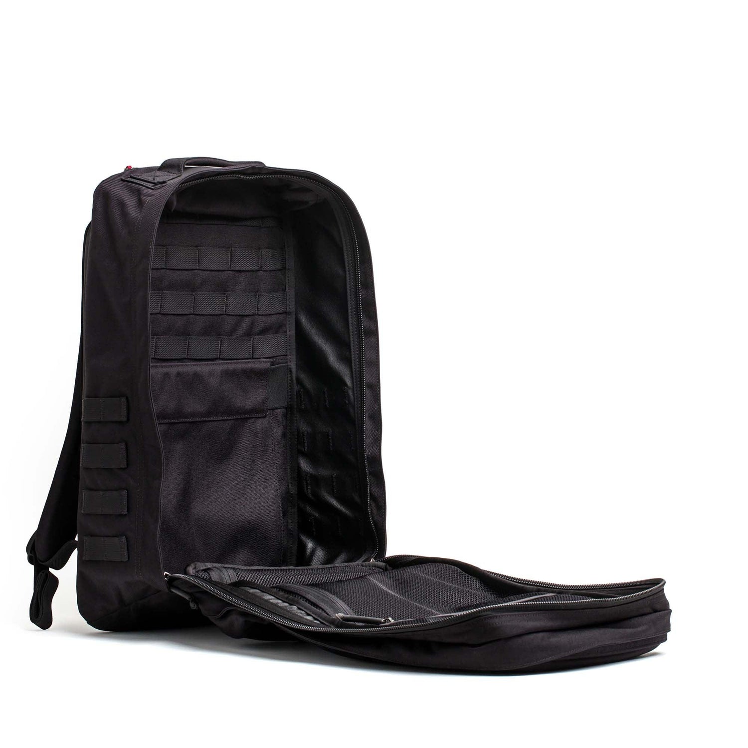 Open GORUCK GR2 34L black rucksack showing spacious interior and durable nylon shell