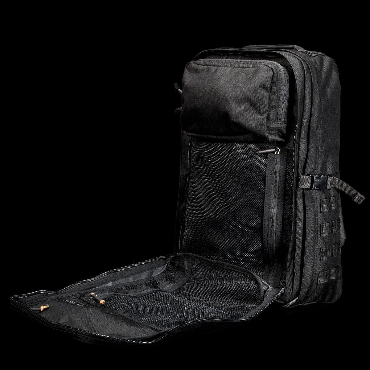 GORUCK black rucksack backpack open to show mesh pockets and rugged interior design