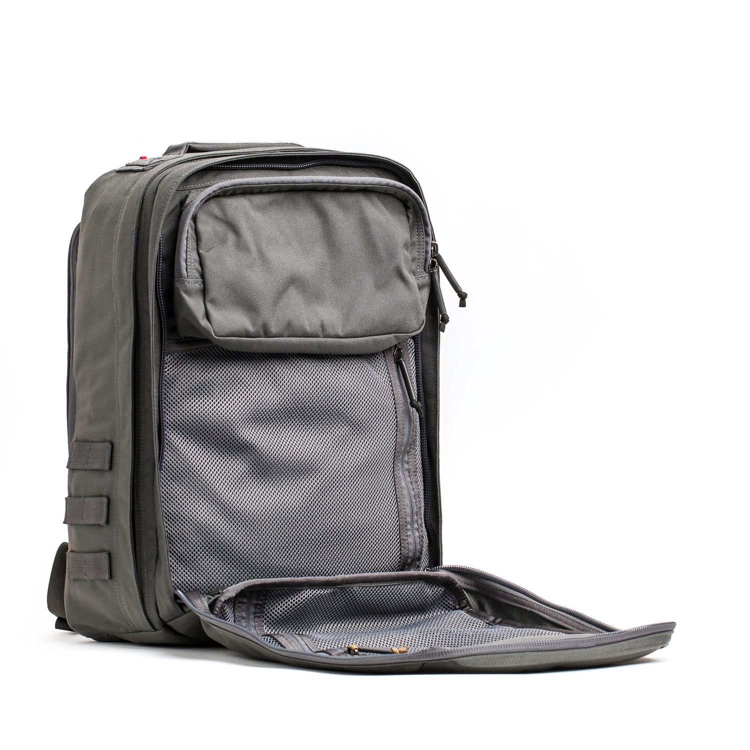 The GR2 - Cordura backpack in gray is shown with its front compartment unzipped, revealing a mesh inner pocket, all set against a white background.
