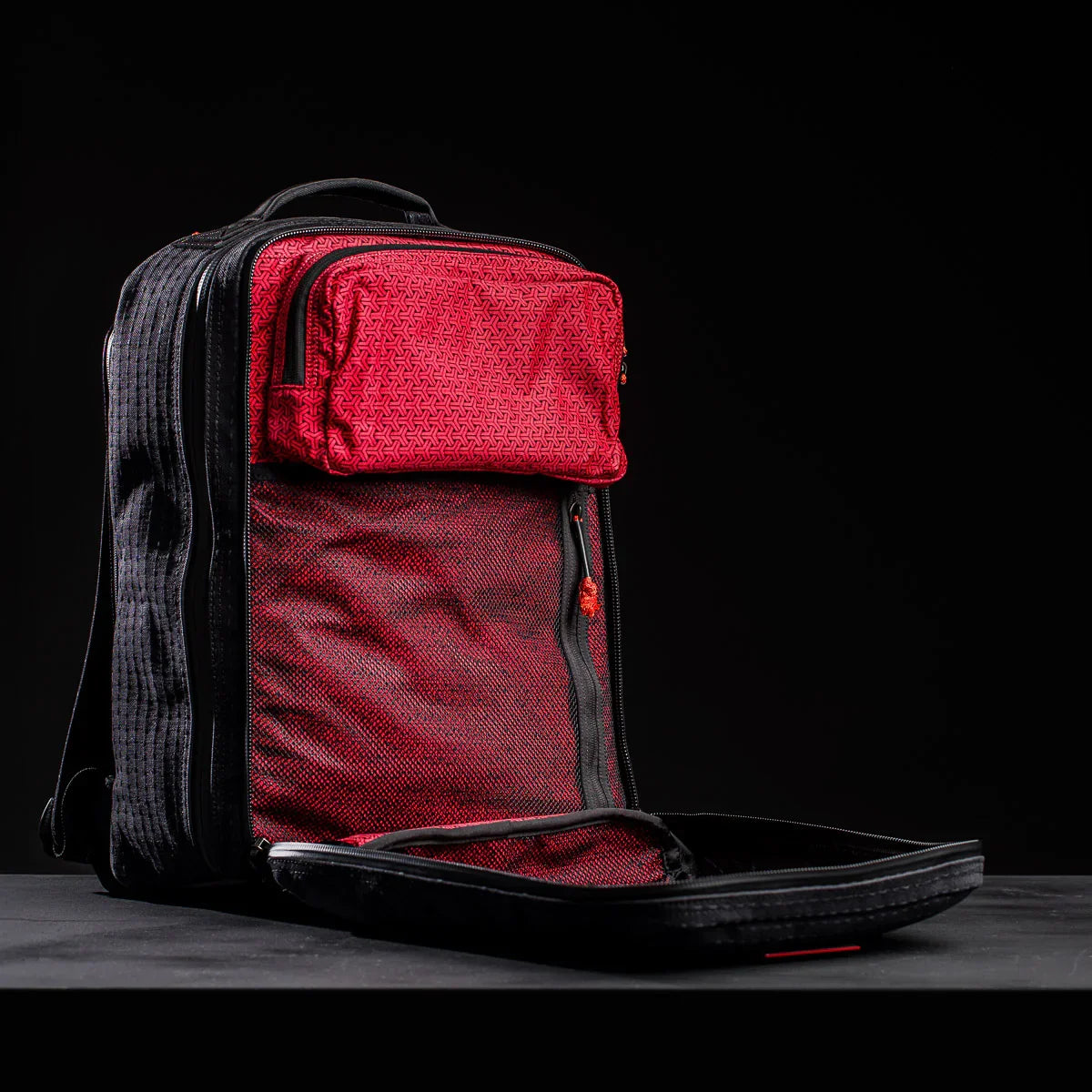 GORUCK GR2 26L Samurai 2.0 black backpack open to show red interior compartments