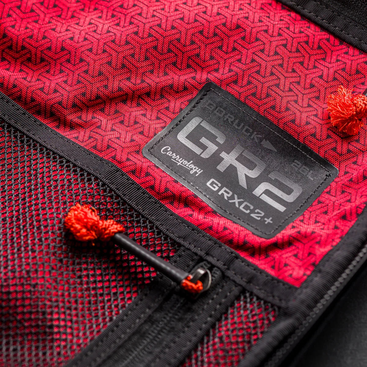 GORUCK GR2 26L rucksack interior with red patterned fabric and mesh pocket close-up