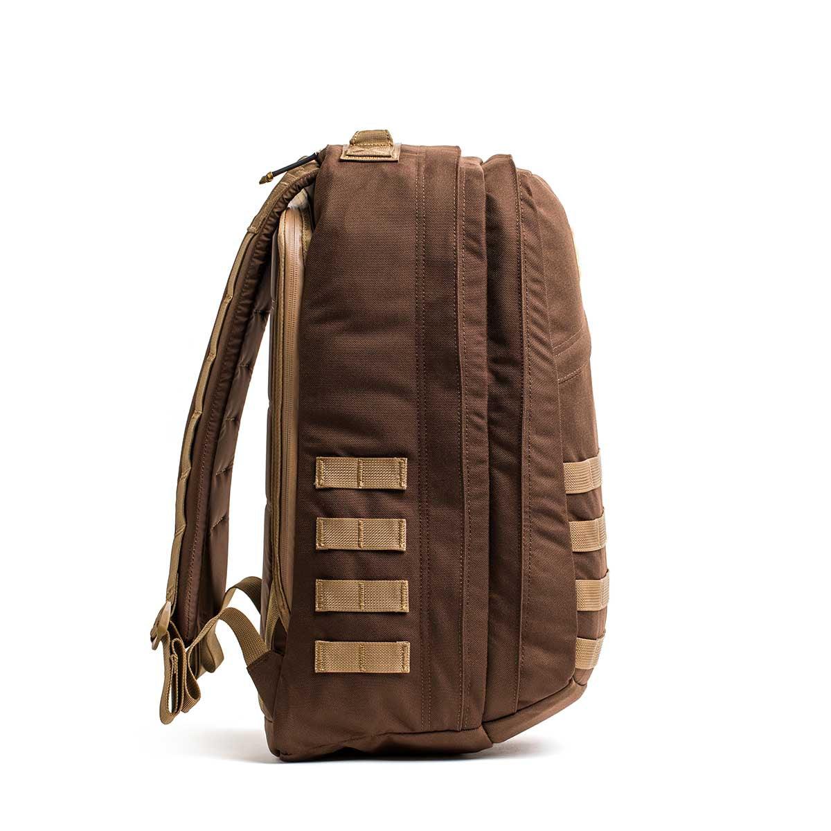 GORUCK brown Cordura rucksack side view with tan accents and multiple gear loops