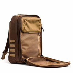GORUCK brown rucking backpack with open front showing mesh interior and coyote accents