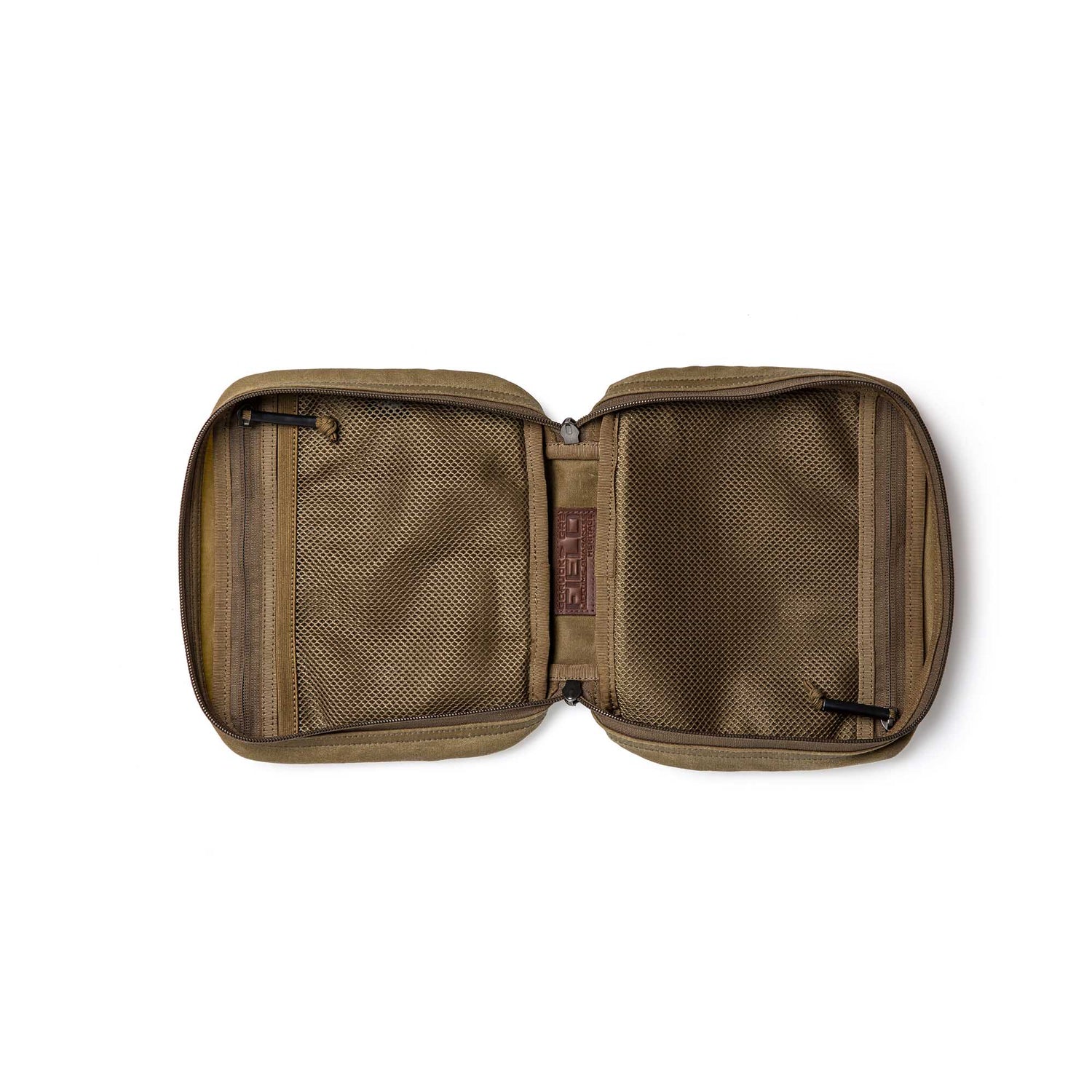 A tan GR2 Field Pocket - Waxed Canvas unzipped flat, revealing mesh pockets and compartments on both sides.