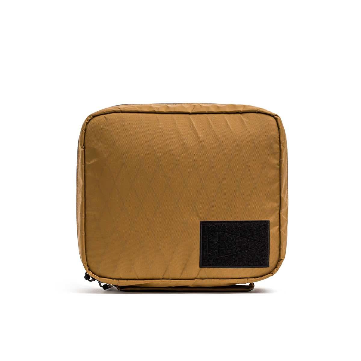 GORUCK coyote brown XPAC field pouch with front patch on white background