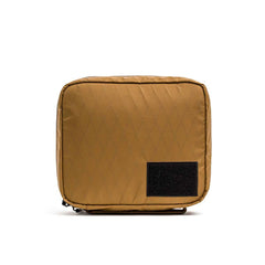 GORUCK coyote brown XPAC field pouch with front patch on white background
