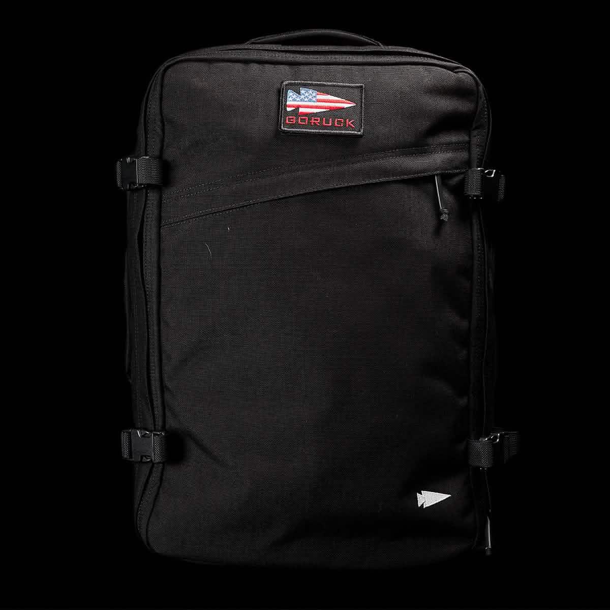 GORUCK GR3 black rucksack with American flag patch, durable rucking backpack on black background
