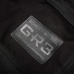 GORUCK GR3 35L black rucksack patch with lifetime guarantee label close-up