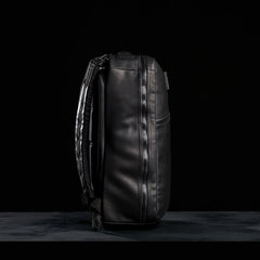 GORUCK black leather rucksack side view with rugged zipper, durable rucking gear