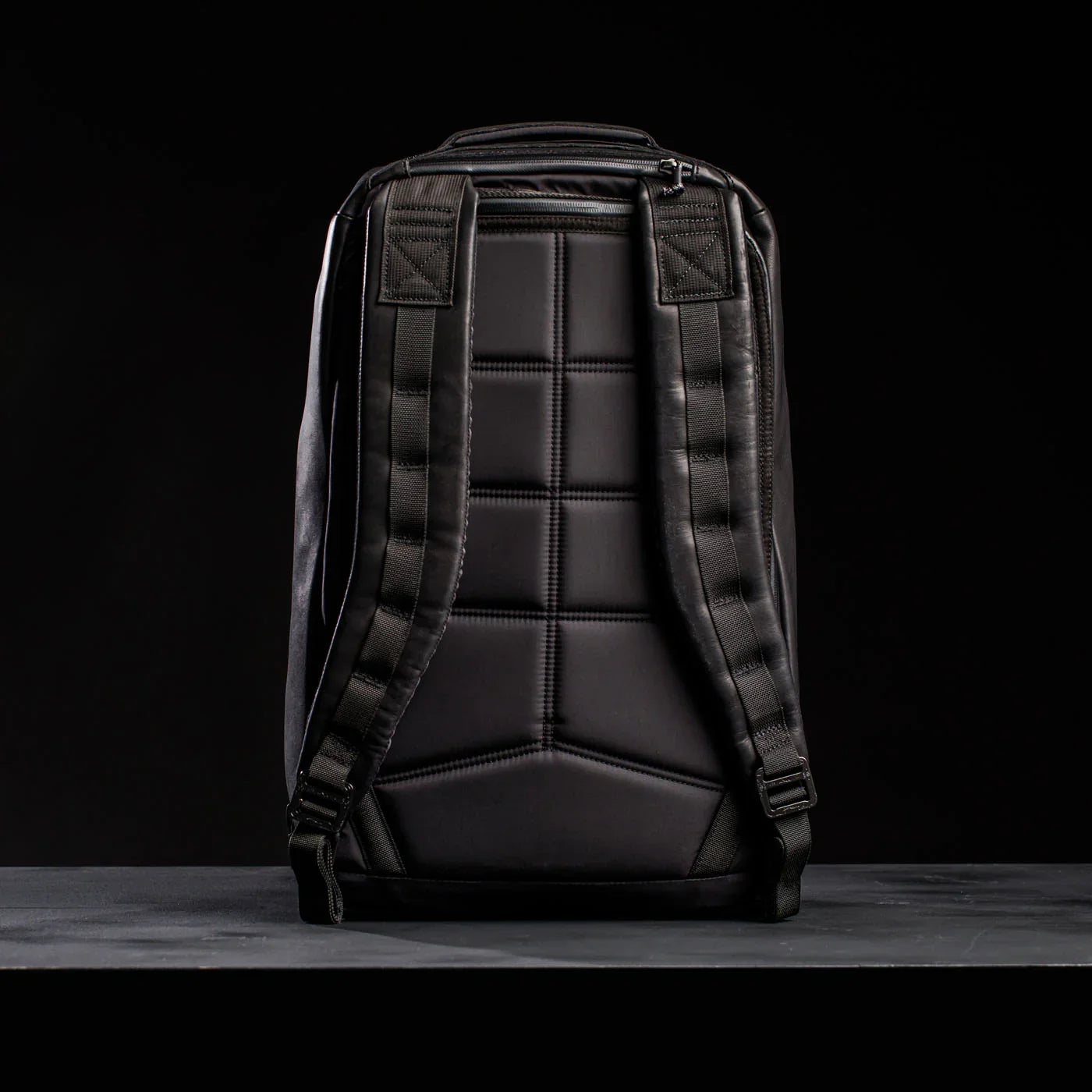 GORUCK black rucksack back view with padded straps and reinforced stitching on black background
