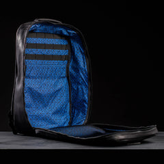 GORUCK rucksack open to show blue patterned interior and black organization straps