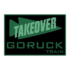 GORUCK Takeover Train patch with green text and arrow design on a black background