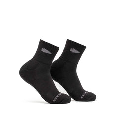 GORUCK black Merino wool trail cuff socks with arrow pattern on ankle, white background