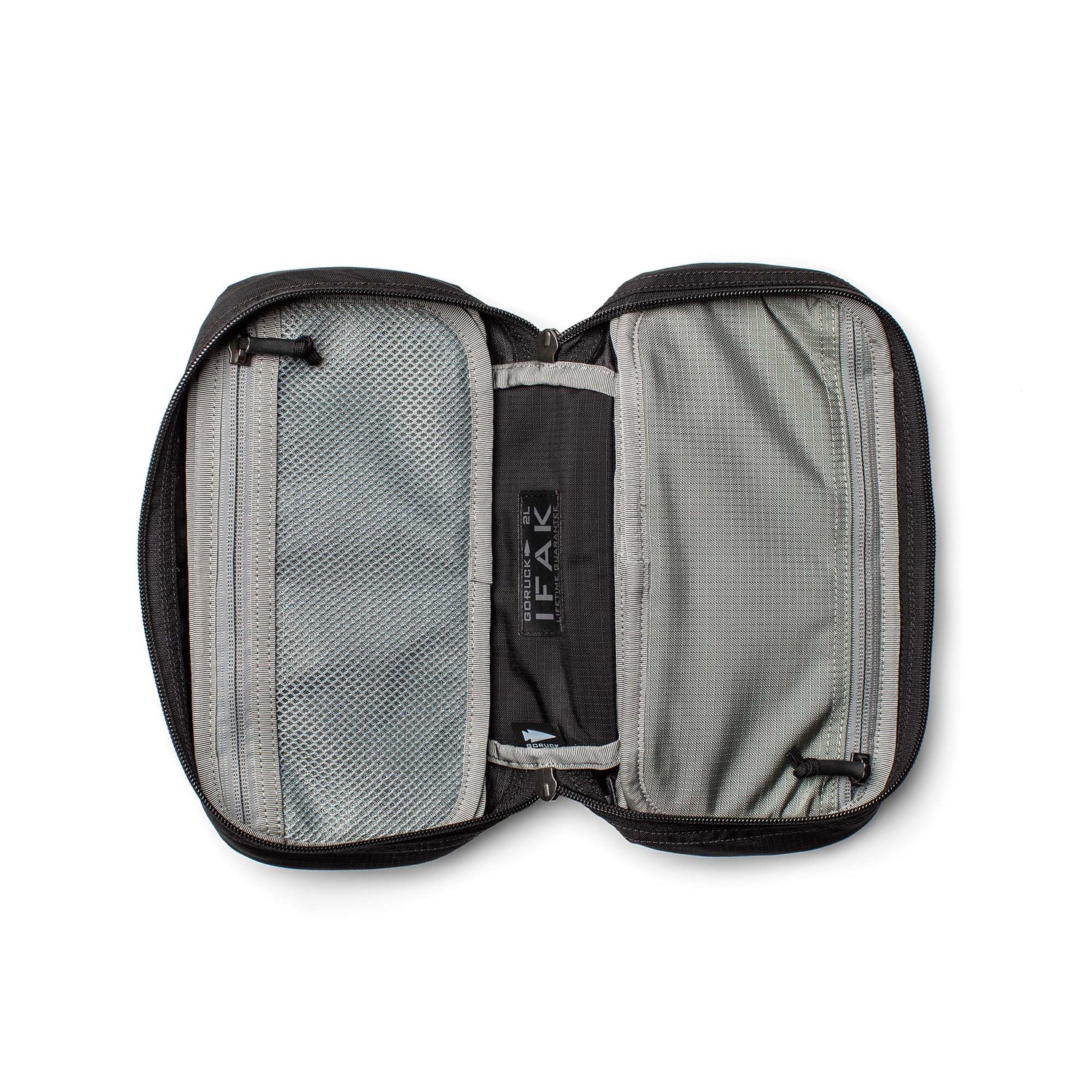 An open black and gray IFAK tactical medical pouch with mesh and fabric compartments lays flat on a white background.
