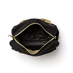 GORUCK black and light gold rucksack gym bag with open top showing spacious interior