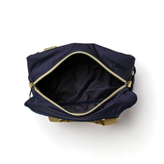 GORUCK navy and light gold gym duffel bag open top view, spacious main compartment