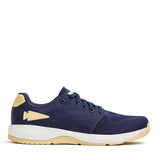 GORUCK navy blue ballistic trainer shoe with gold accents and white sole, side view