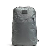 The GR1 USA - Waterproof X-PAC is a gray backpack with a diagonal zippered front pocket, top handle, and rectangular upper patch—ideal for daily adventures and travel thanks to its durable, waterproof design.