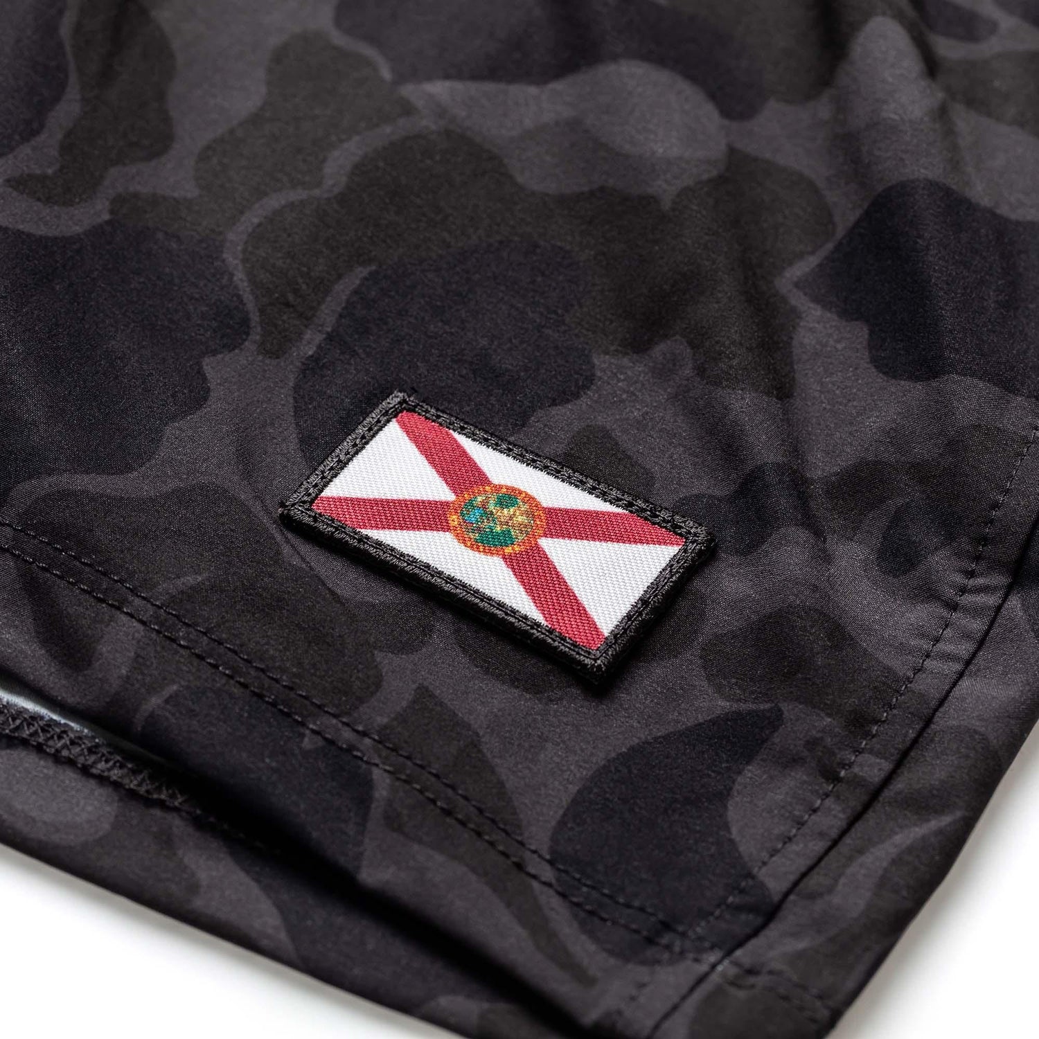 GORUCK men's training shorts in black frogskin camo with Florida flag patch detail