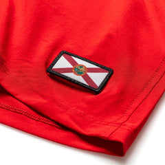 GORUCK red men's training shorts with Florida flag patch detail