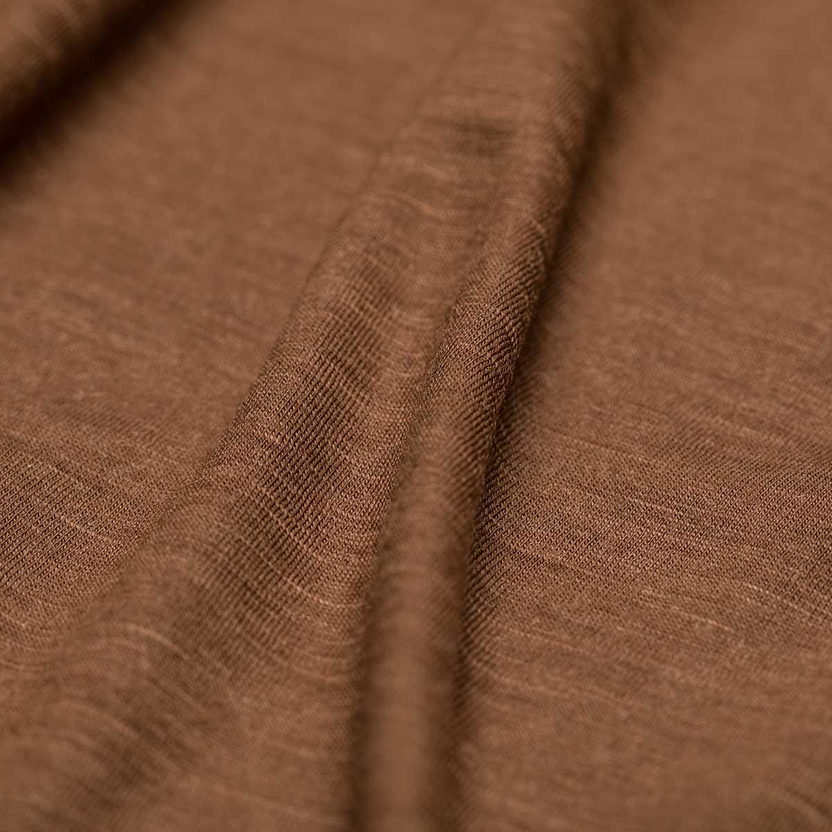 Close-up of brown Merino wool fabric texture from GORUCK rucking gear shirt
