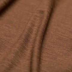 Close-up of brown Merino wool fabric texture from GORUCK rucking gear shirt