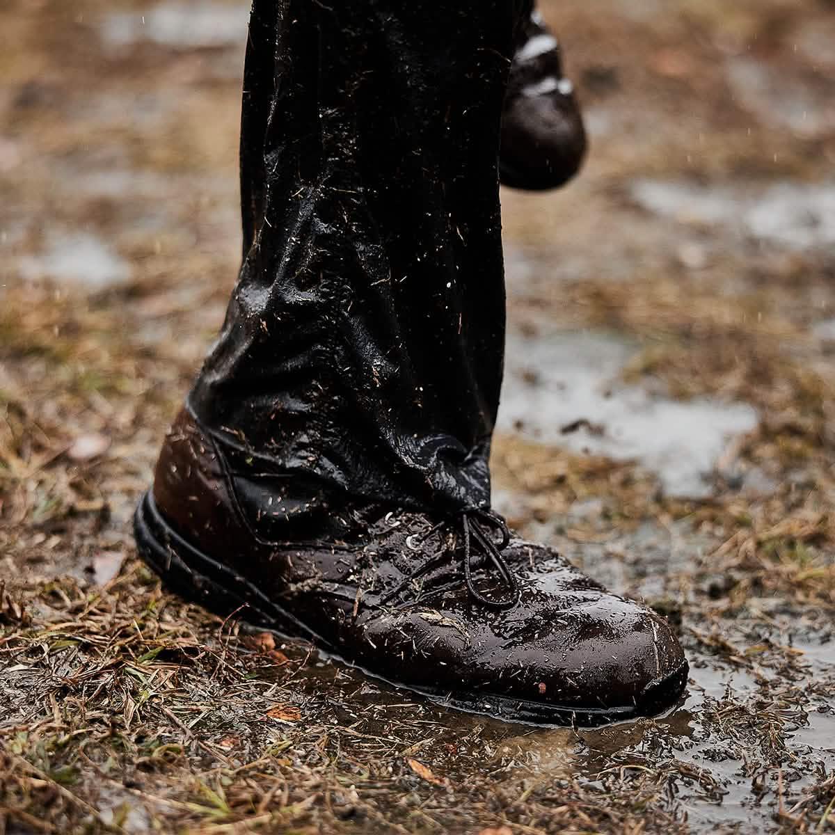 GORUCK Merino sock and rugged boot in wet, muddy outdoor rucking environment
