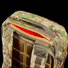 GORUCK Multicam tactical backpack close-up with open zipper and padded straps