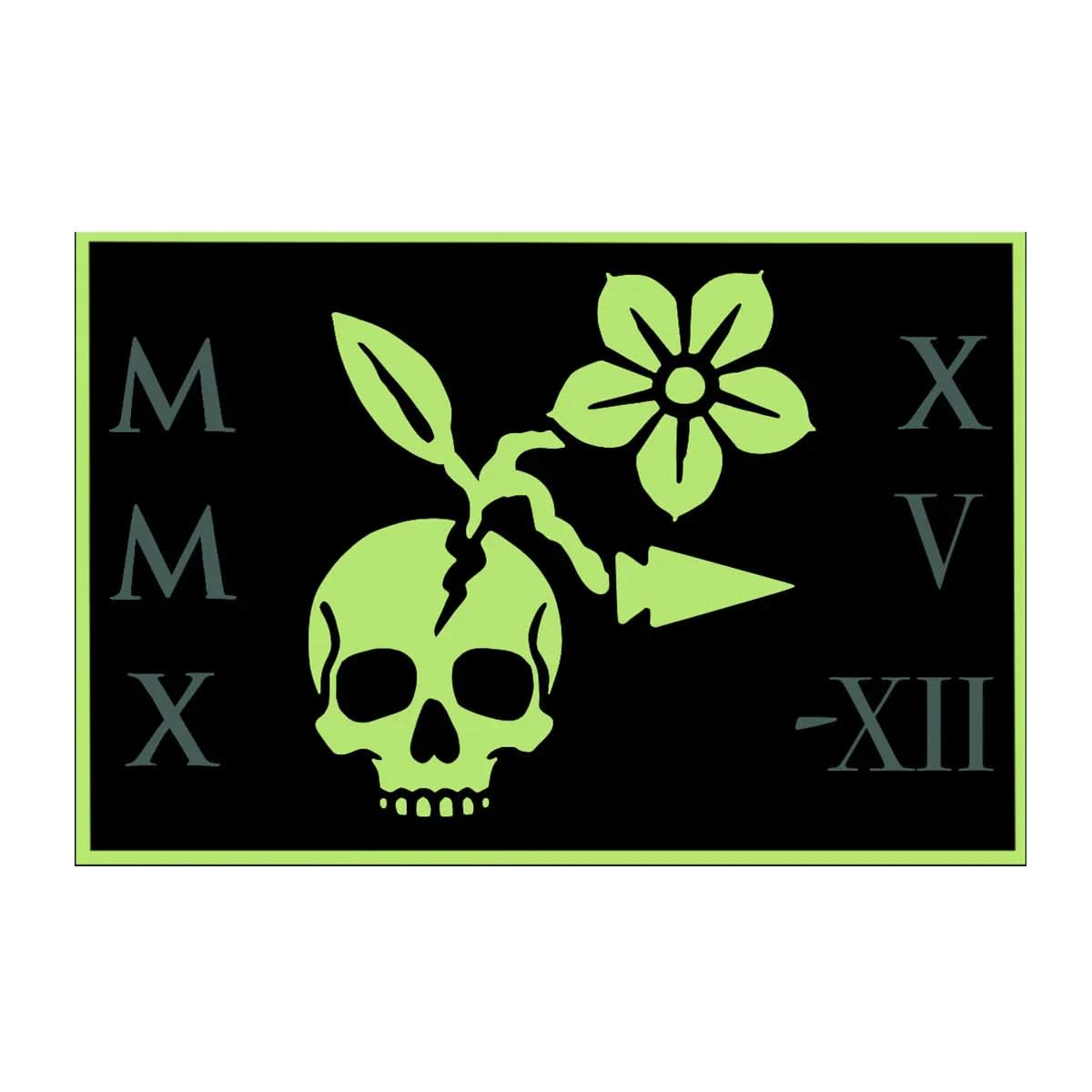 GORUCK patch with green skull, flower, arrow, and Roman numerals on black background