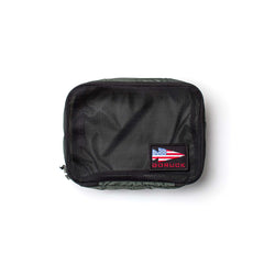Packing Cubes: Black zippered pouch made of durable 200D nylon with a mesh front for visibility and a GORUCK logo patch with the American flag—ideal for travel organization or use as packing cubes.