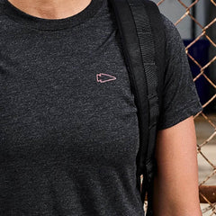 GORUCK black athletic t-shirt with arrowhead logo and backpack strap outdoors