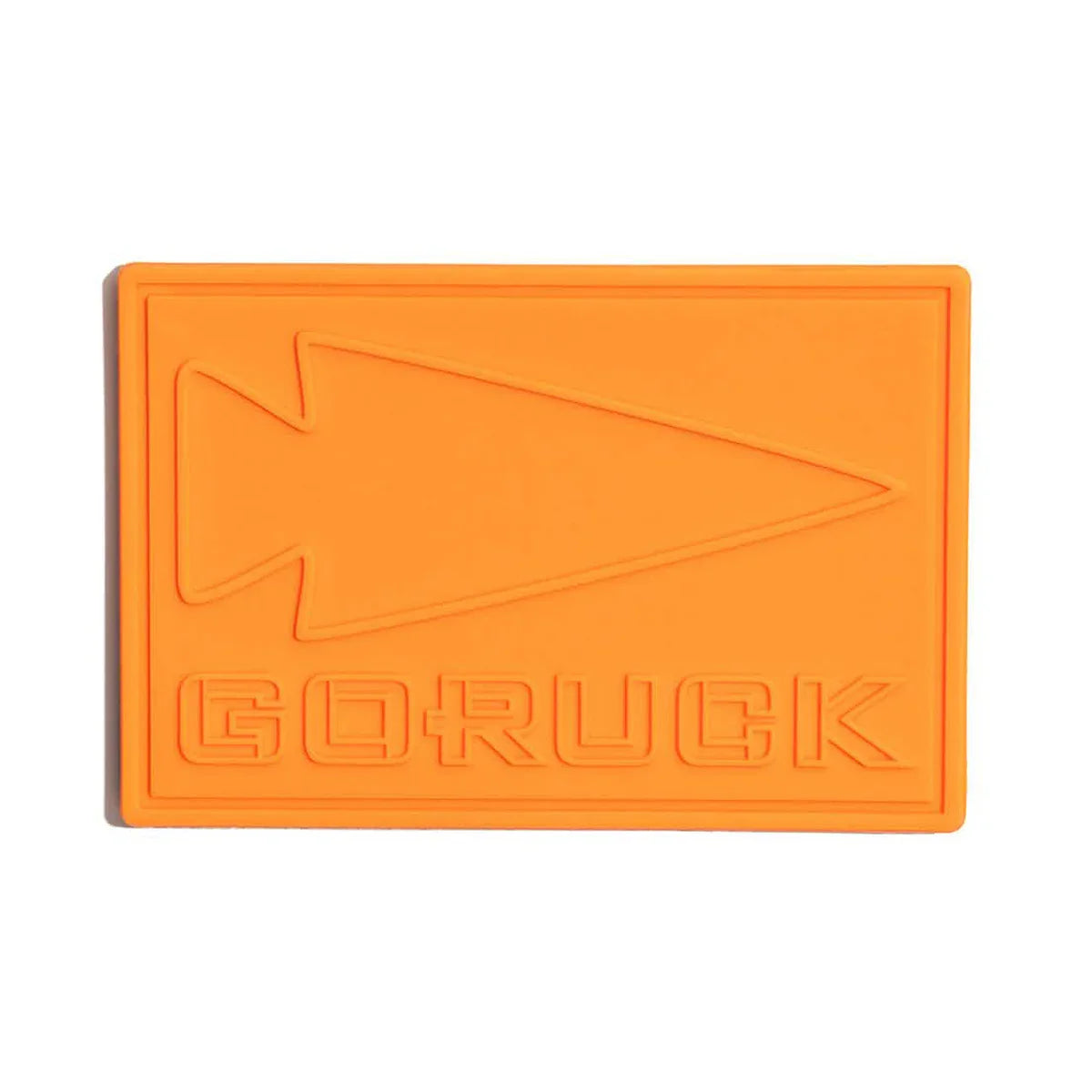 GORUCK orange PVC patch with arrowhead logo and embossed lettering on white background